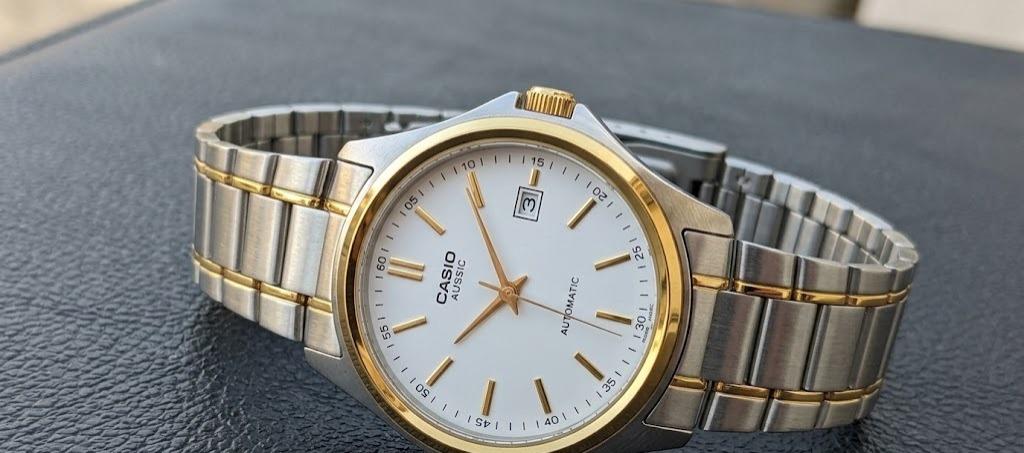 Casio MTP-1183G · Acero dorado / Cara blanca